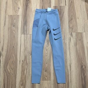 Nike Kids Light Blue Leggings with Black Swoosh